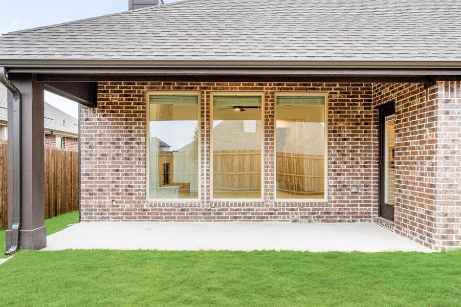 Exterior details and patio area of a home in West Crossing, Anna (Image 26). Exterior details and patio area of a home in West Crossing, Anna (Image 26).