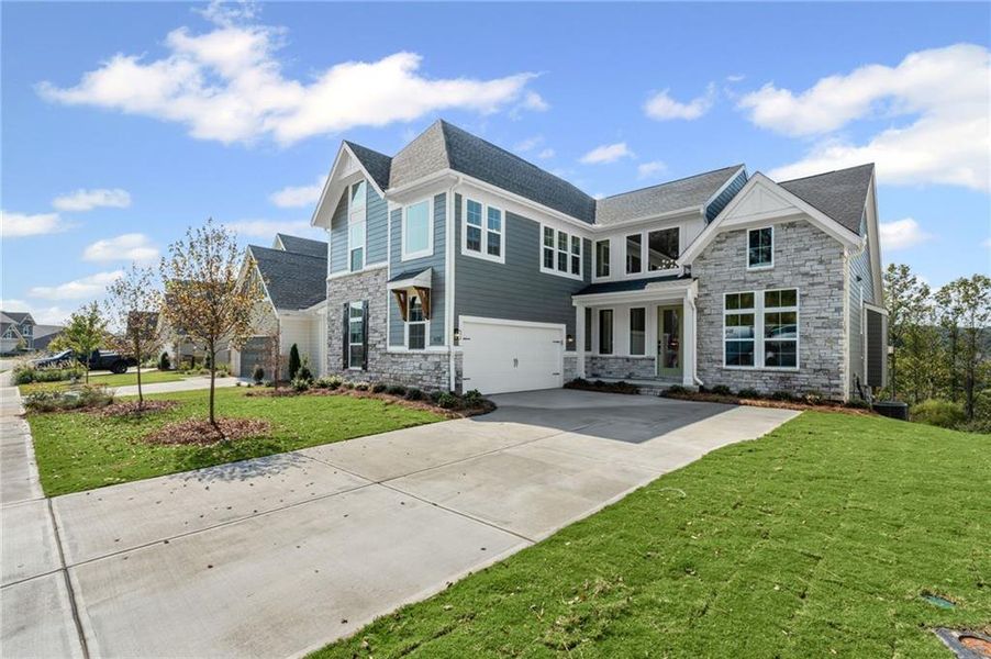 Front exterior of a new home in Twin Lakes, Hoschton, GA, highlighting curb appeal (Image 24).