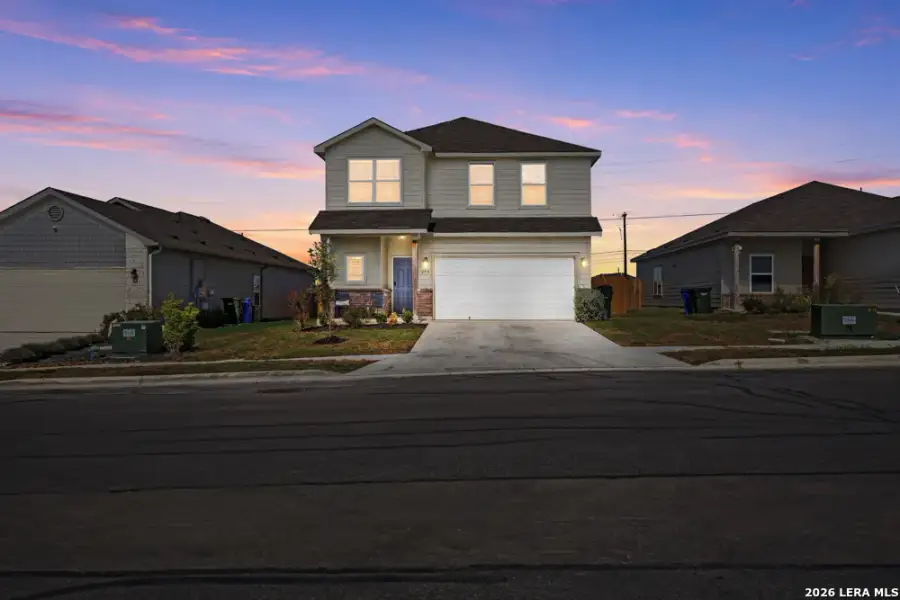 Front exterior of a new home in Legend Pond, New Braunfels, TX, highlighting curb appeal (Image 23).