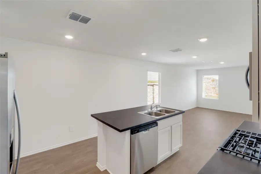 Furnished interior view inside a new home in Prairie Lakes, Buda (Image 7).