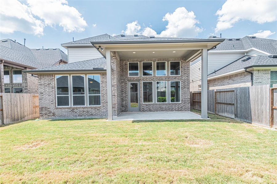 Front exterior of a new home in , Fulshear, TX, highlighting curb appeal (Image 16). Front exterior of a new home in , Fulshear, TX, highlighting curb appeal (Image 16).