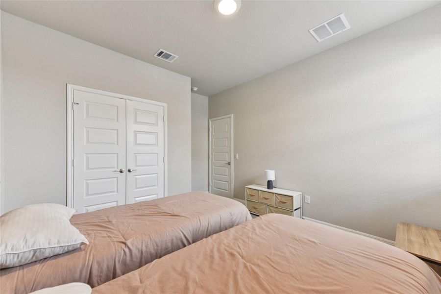 Bedroom with a closet Bedroom with a closet