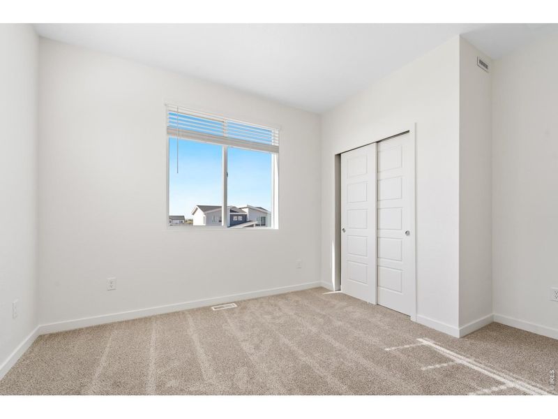 Spacious, unfurnished interior of a new home in Liberty Draw, Evans (Image 17).