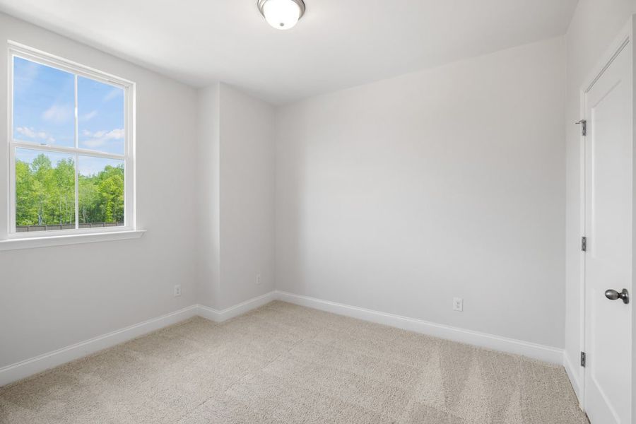 Representative unfurnished interior of a home built from the Atkinson by UnionMain Homes in Austin Springs, Bethlehem (Image 25).
