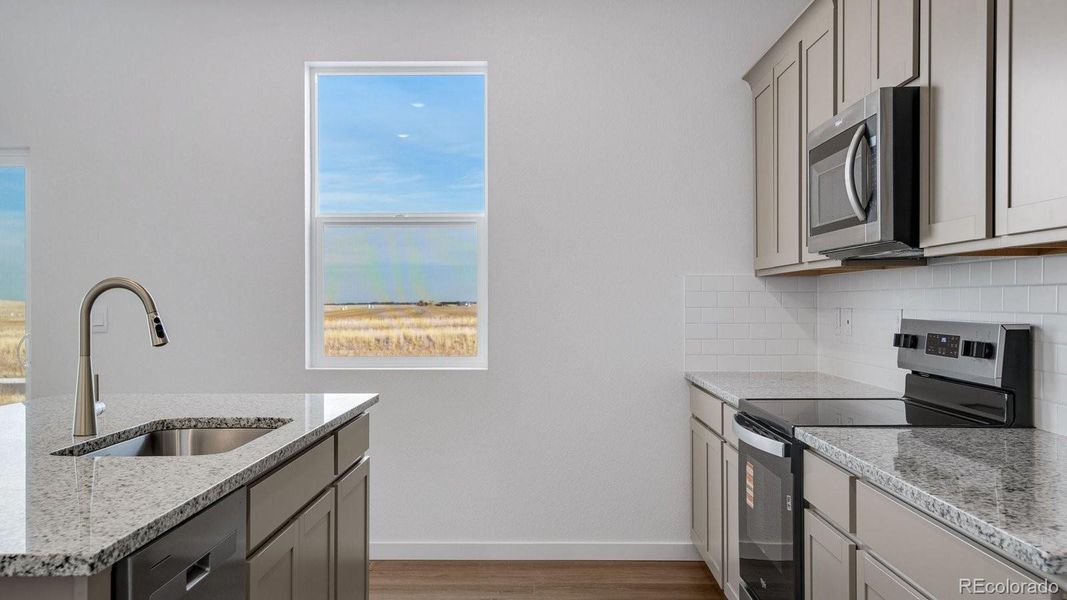 Furnished interior view inside a new home in Spring Valley Ranch, Elizabeth (Image 9).