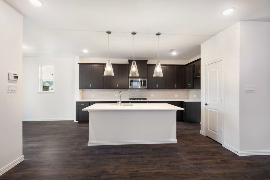 Representative furnished interior of a home built from the Hawthorne by UnionMain Homes in Edgewater, Fate (Image 10).