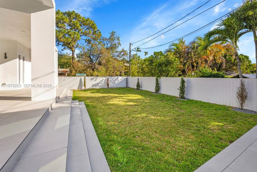 Exterior details and patio area of a home in , Miami Springs (Image 26).