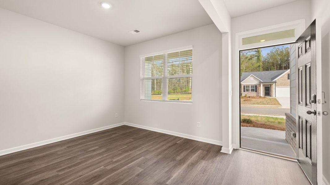 Representative unfurnished interior of a home built from the Penwell by D.R. Horton in Champion's Run, Lithonia (Image 13).