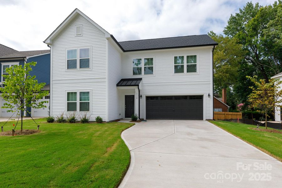 Front exterior of a new home in , Charlotte, NC, highlighting curb appeal (Image 16).