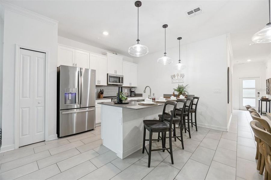 Furnished interior view inside a new home in , Kissimmee (Image 8).