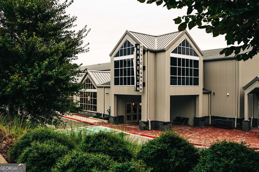 Front exterior of a new home in Rosewood Lake Estates, Hoschton, GA, highlighting curb appeal (Image 26).