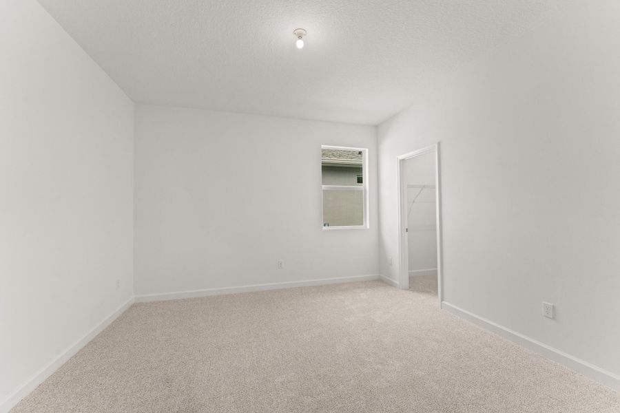 Spacious, unfurnished interior of a new home in Tradition - Cadence, Port St. Lucie (Image 10).