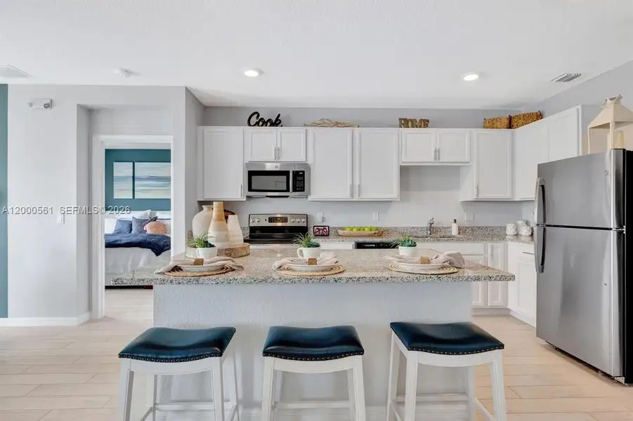 Furnished interior view inside a new home in Aspire at Waterstone, Fort Pierce (Image 4). Furnished interior view inside a new home in Aspire at Waterstone, Fort Pierce (Image 4).