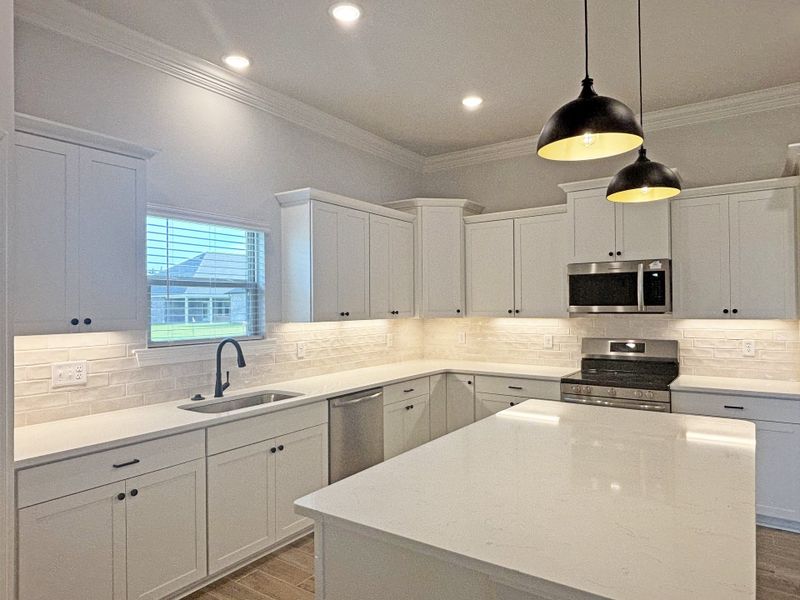 Furnished interior view inside a new home in Bird Song at Hammock Bay, Freeport (Image 9).