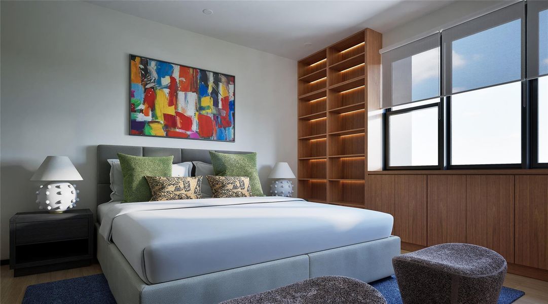 Bedroom featuring wood finished floors Bedroom featuring wood finished floors