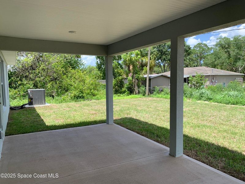 Exterior details and patio area of a home in Palm Bay, Palm Bay (Image 4).