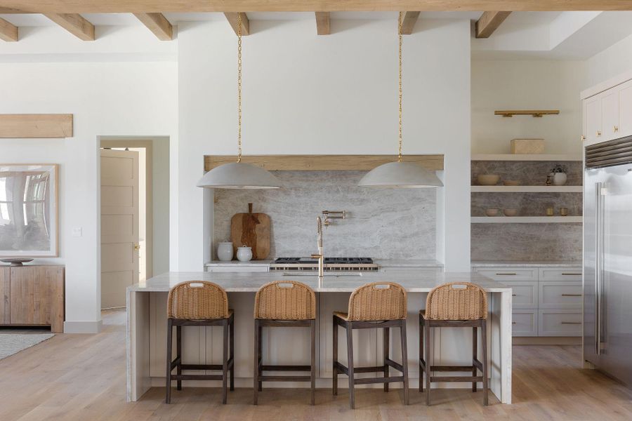 Beautiful gourmet kitchen with waterfall island