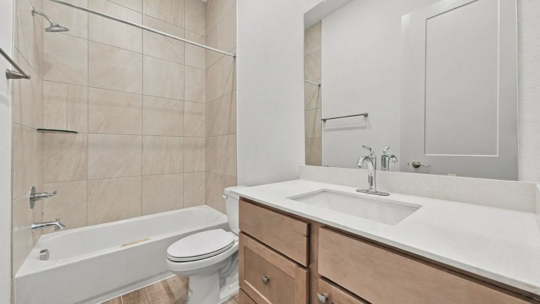 Furnished interior view inside a new home in Attwater 55s, Waller (Image 6).