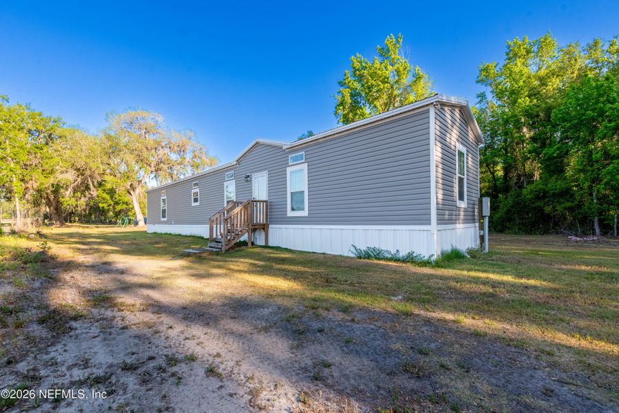 Exterior details and patio area of a home in , Gainesville (Image 18).