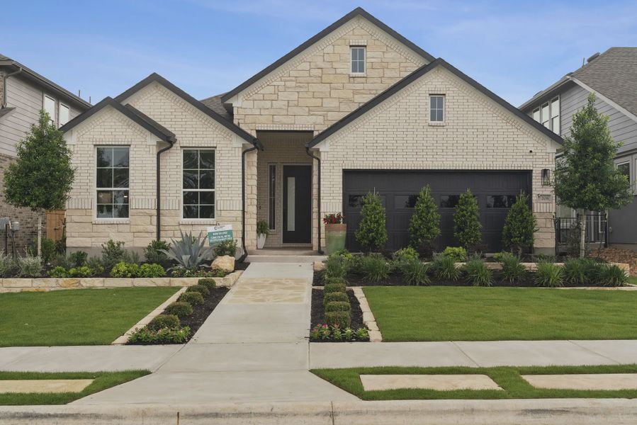 Representative exterior photo of a completed home built from the Barron by Chesmar Homes in Lariat, Liberty Hill, TX (Image 27).