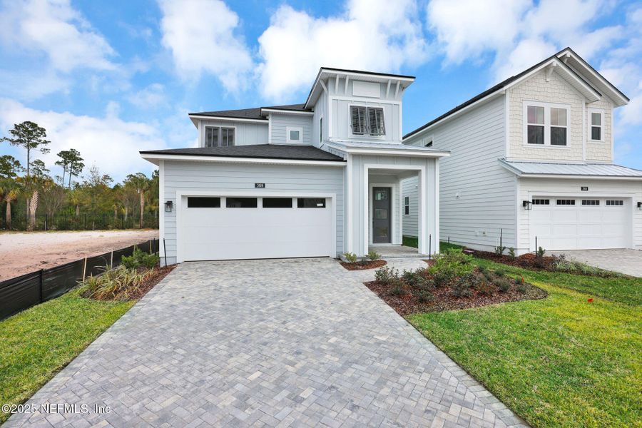 Front exterior of a new home in , Ponte Vedra, FL, highlighting curb appeal (Image 23).