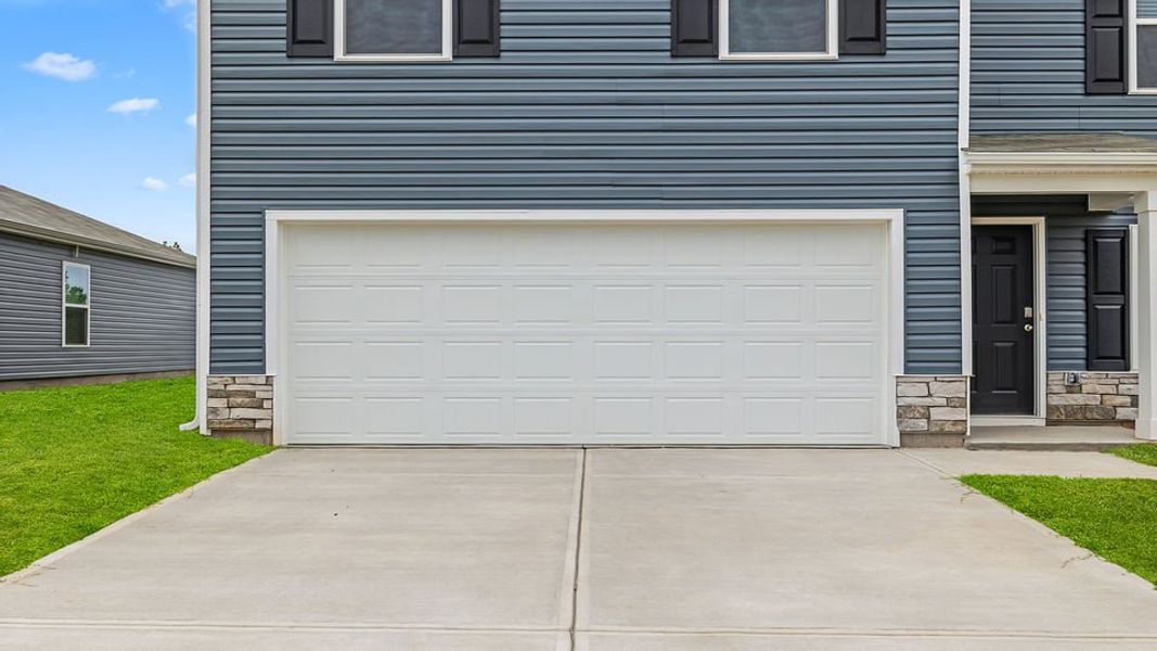 Exterior details and patio area of a home in Lakestone, Woodruff (Image 4).