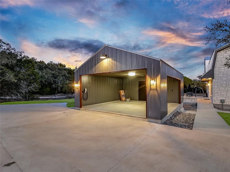 Side Facing Carport with EV chargers and Locked Storage Area