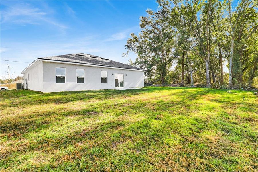Exterior details and patio area of a home in , Ocala (Image 16).