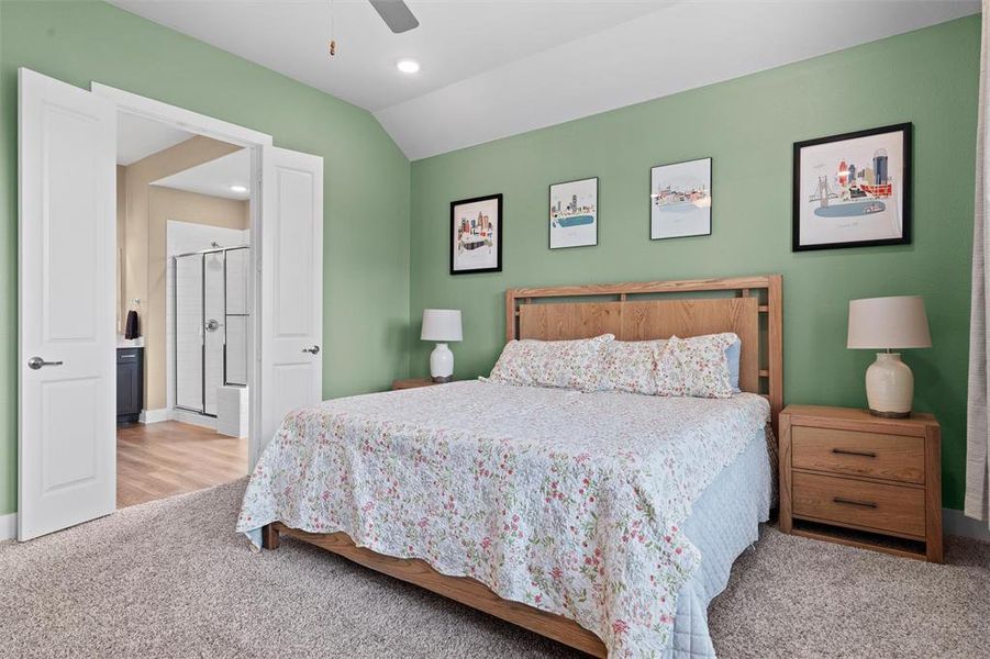 The primary bedroom opens to the primary bath--a luxury, private sanctuary for the owners.