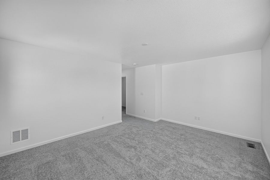 Spacious, unfurnished interior of a new home in Sky Ranch, Watkins (Image 19). Spacious, unfurnished interior of a new home in Sky Ranch, Watkins (Image 19).