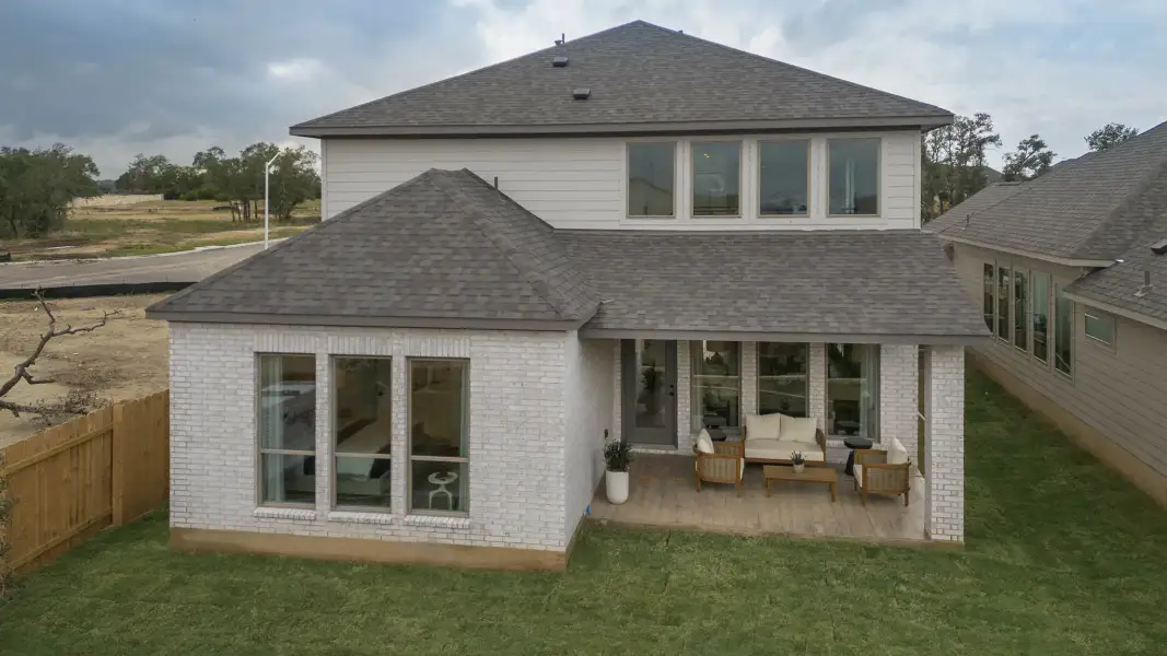 Exterior details and patio area of a home in Grand Central Park, Conroe (Image 3).