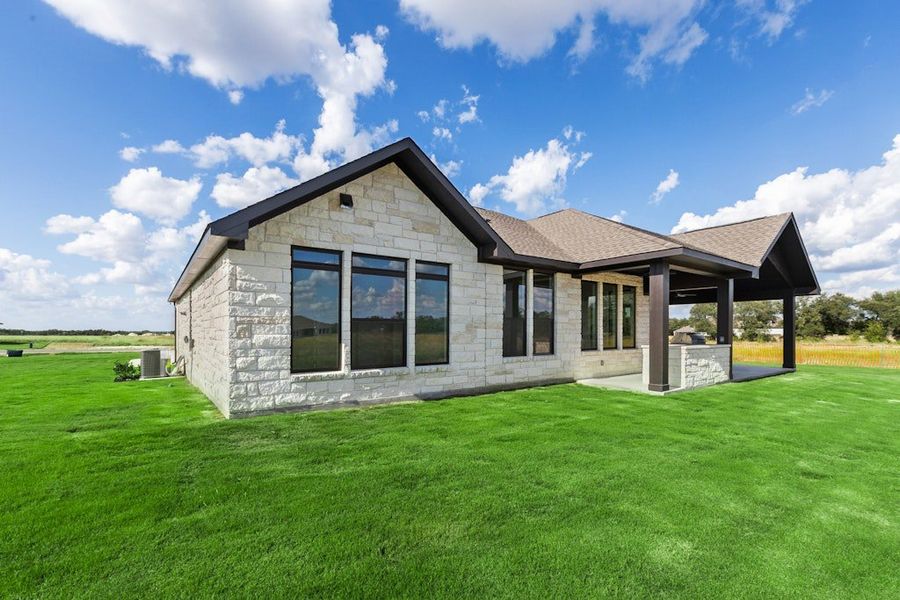 Exterior details and patio area of a home in Leander Estates, Leander (Image 22).