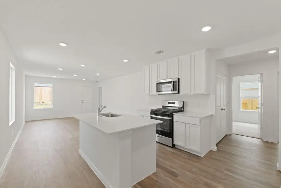Furnished interior view inside a new home in , Willis (Image 3).