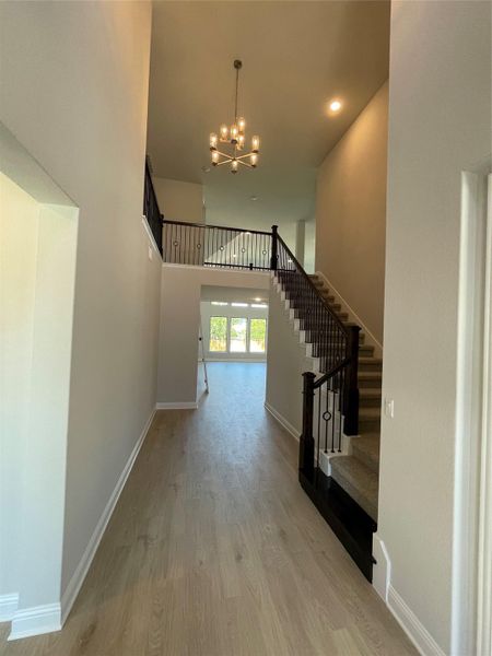 Entry Foyer of home with grand staircase Entry Foyer of home with grand staircase