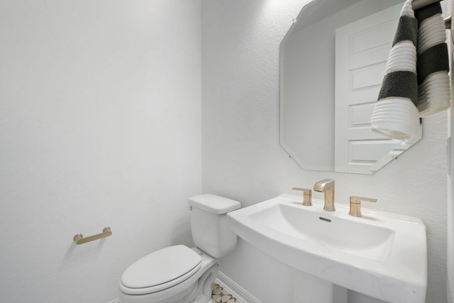 Furnished interior view inside a new home in Parkside on the River 60s, Georgetown (Image 14).