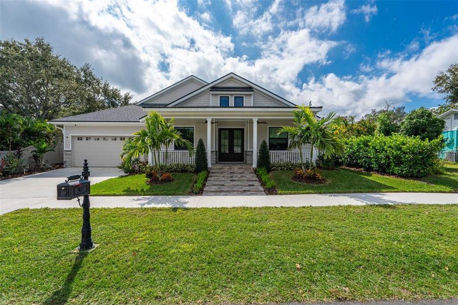 Front exterior of a new home in , Safety Harbor, FL, highlighting curb appeal (Image 2). Front exterior of a new home in , Safety Harbor, FL, highlighting curb appeal (Image 2).