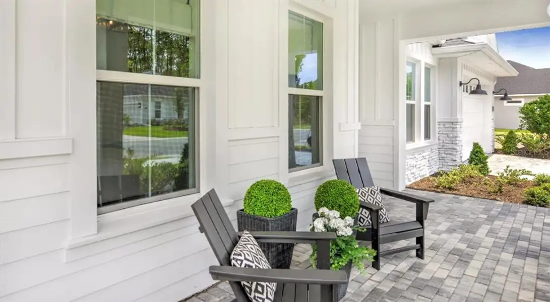 Exterior details and patio area of a home in Westlake Single Family, Ormond Beach (Image 3).