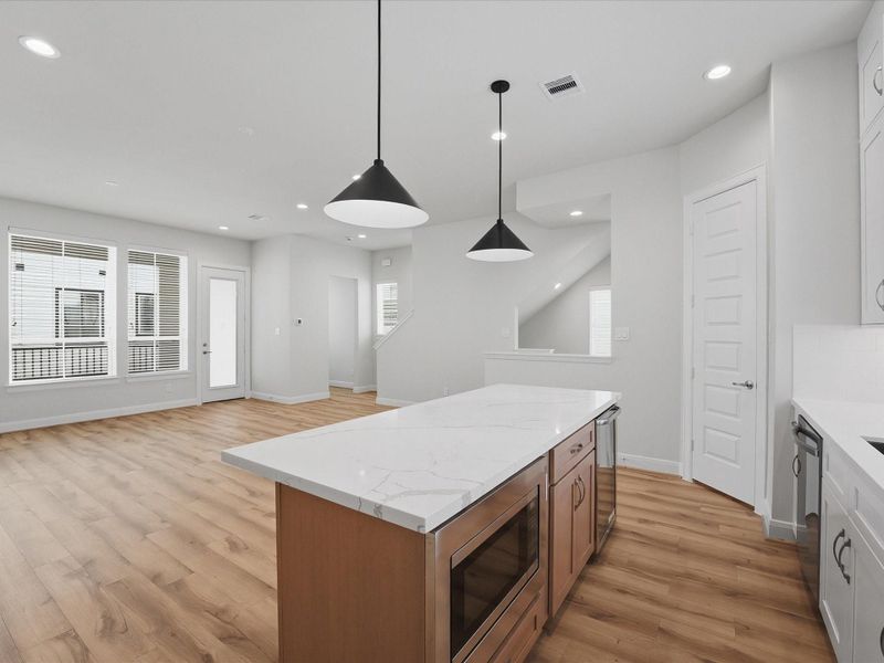 Furnished interior view inside a new home in The Corner At Buffalo Pointe, Houston (Image 9).