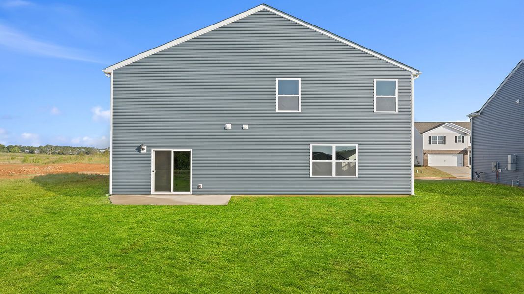 Front exterior of a new home in Chestnut Ridge, Greenville, SC, highlighting curb appeal (Image 2).