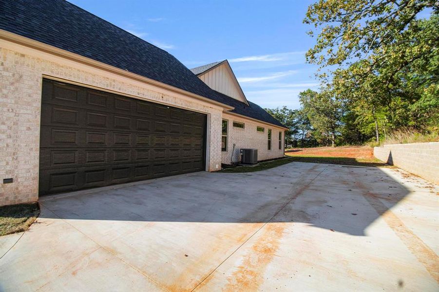 Exterior details and patio area of a home in , Lindale (Image 3).