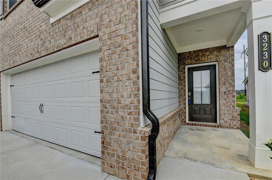 Exterior details and patio area of a home in Westgate Enclave, Loganville (Image 25).