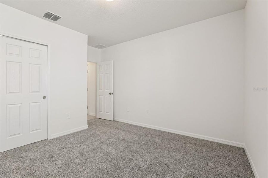 Spacious, unfurnished interior of a new home in Lawson Dunes - Signature Series, Haines City (Image 29). Spacious, unfurnished interior of a new home in Lawson Dunes - Signature Series, Haines City (Image 29).