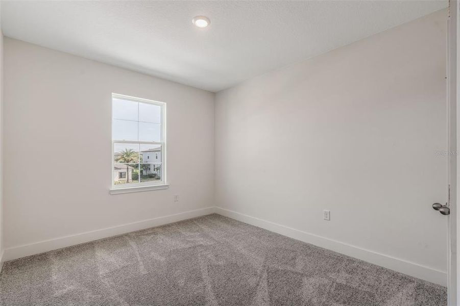 Spacious, unfurnished interior of a new home in Magnolia Reserve, Ocoee (Image 18).