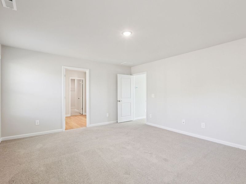 Spacious, unfurnished interior of a new home in Marshburn Landing - Signature Series, Wendell (Image 16).