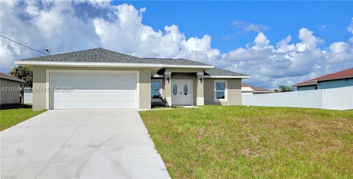 Front exterior of a new home in , Labelle, FL, highlighting curb appeal (Image 1). Front exterior of a new home in , Labelle, FL, highlighting curb appeal (Image 1).