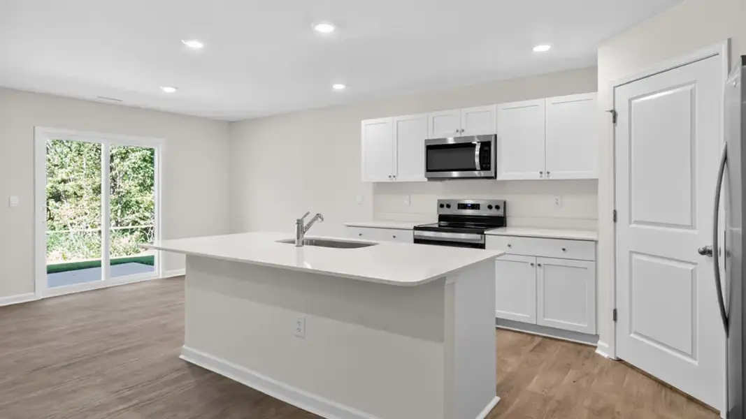 Furnished interior view inside a new home in Mangum Farms, Stem (Image 7).