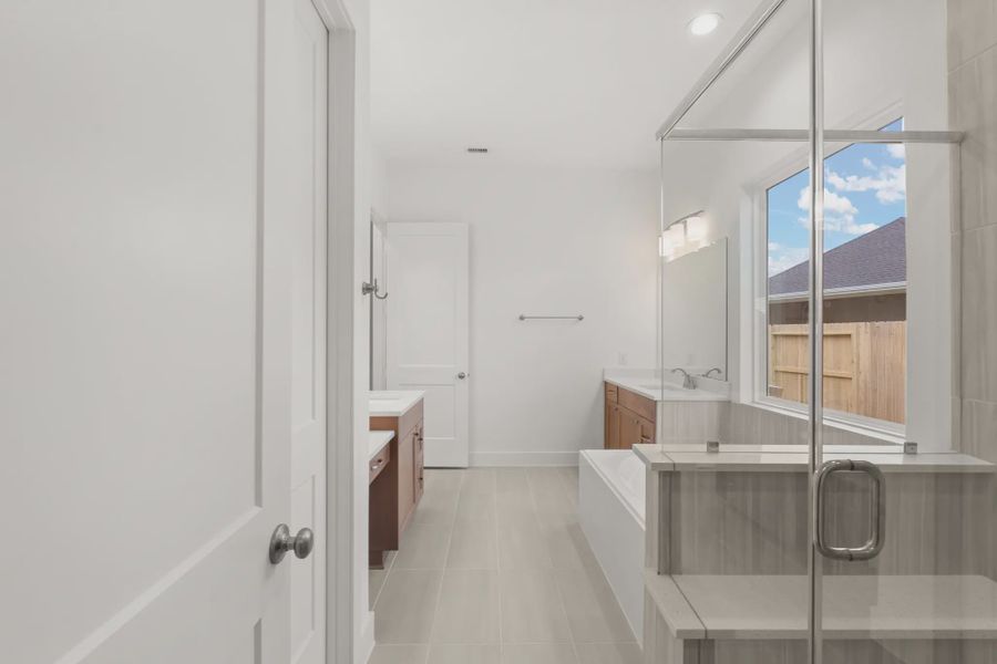 Representative furnished interior of a home built from the Mickelson by Chesmar Homes in Riceland Alley Loads, Mont Belvieu (Image 64).