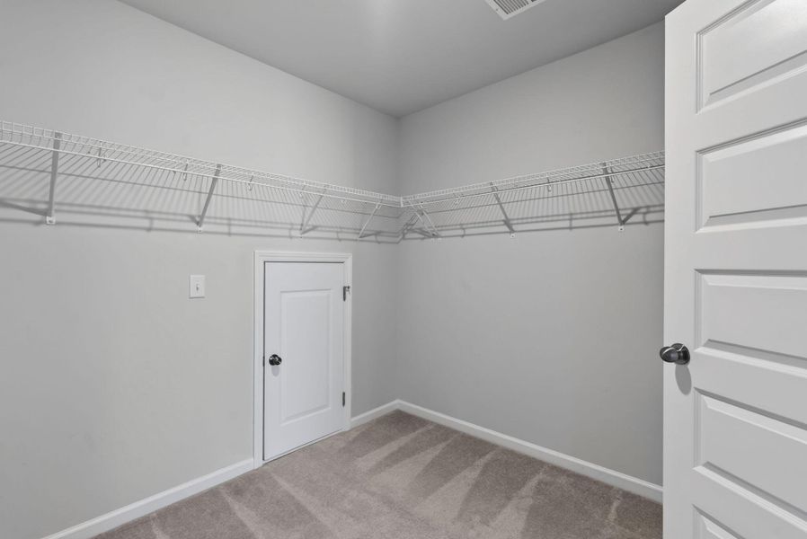 Spacious, unfurnished interior of a new home in Sweetgrass at Summers Corner, Summerville (Image 29).