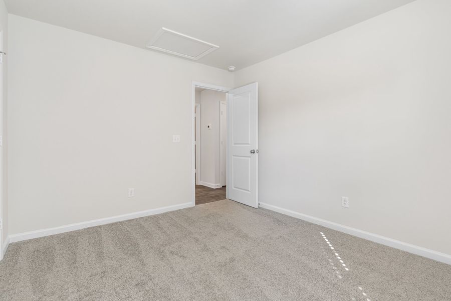 Representative unfurnished interior of a home built from the Juniper B by McGuinn Homes in South Welcome, Greenville (Image 29). Representative unfurnished interior of a home built from the Juniper B by McGuinn Homes in South Welcome, Greenville (Image 29).