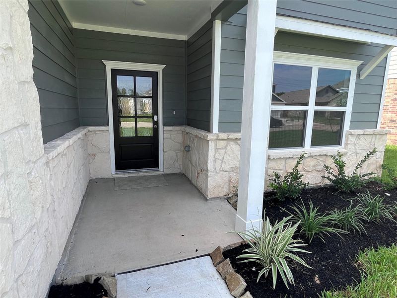 Front exterior of a new home in Kendall Lakes, Alvin, TX, highlighting curb appeal (Image 1). Front exterior of a new home in Kendall Lakes, Alvin, TX, highlighting curb appeal (Image 1).